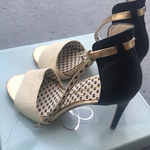 Brand new. Black, gold & off white snake skin